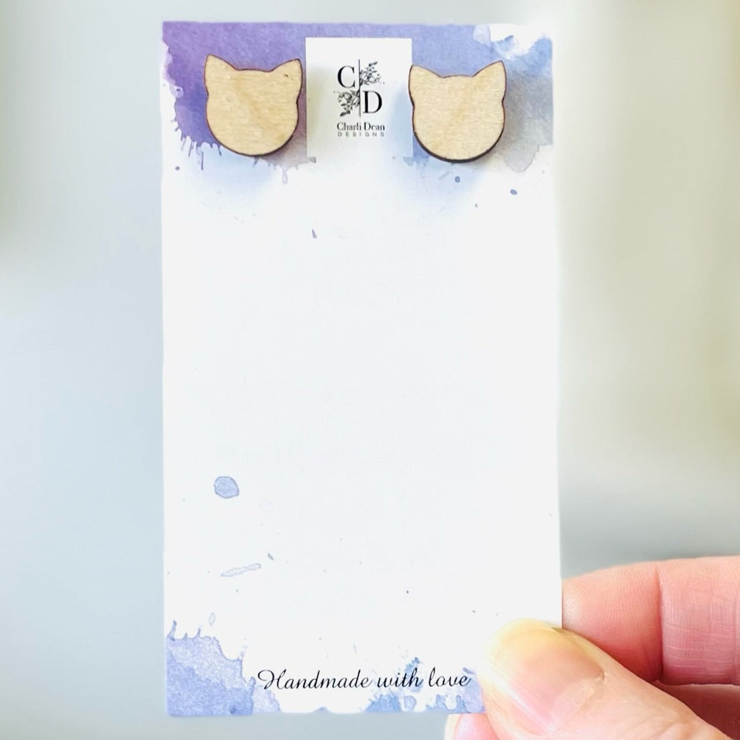 cat face silhouette button earrings
